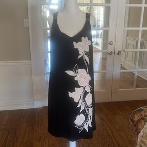 NWOT- WhiteHouseBlackMarket dress with gorgeous lace in lay. A dramatic Dress!